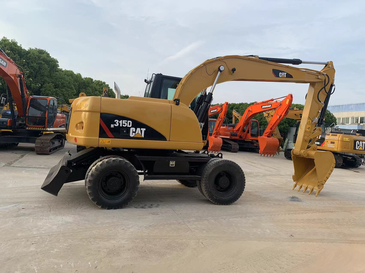 Caterpillar M315D Wheel Excavator Moving by Tires - Bager točkaš: slika 3 Caterpillar M315D Wheel Excavator Moving by Tires - Bager točkaš: slika 3