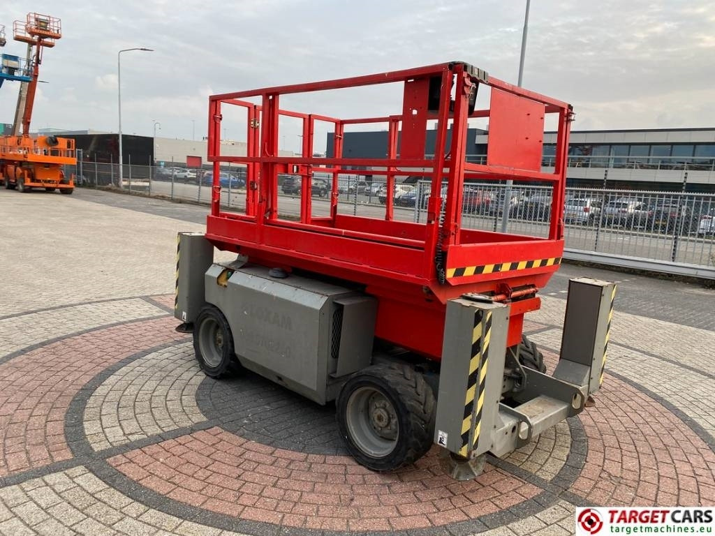Genie GS-2668RT Diesel 4x4 Scissor Work Lift 992cm - Lift u obliku makaza: slika 2 Genie GS-2668RT Diesel 4x4 Scissor Work Lift 992cm - Lift u obliku makaza: slika 2
