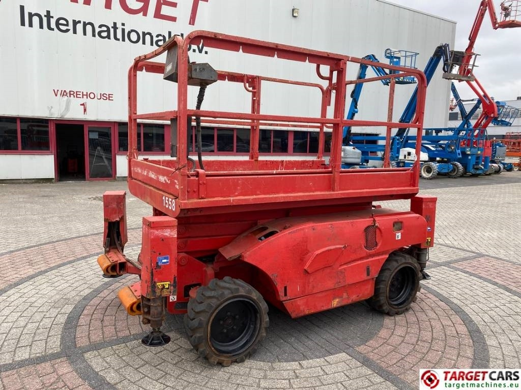 Haulotte Compact 10DX Diesel 4x4 Scissor Work Lift 1015cm - Lift u obliku makaza: slika 1 Haulotte Compact 10DX Diesel 4x4 Scissor Work Lift 1015cm - Lift u obliku makaza: slika 1