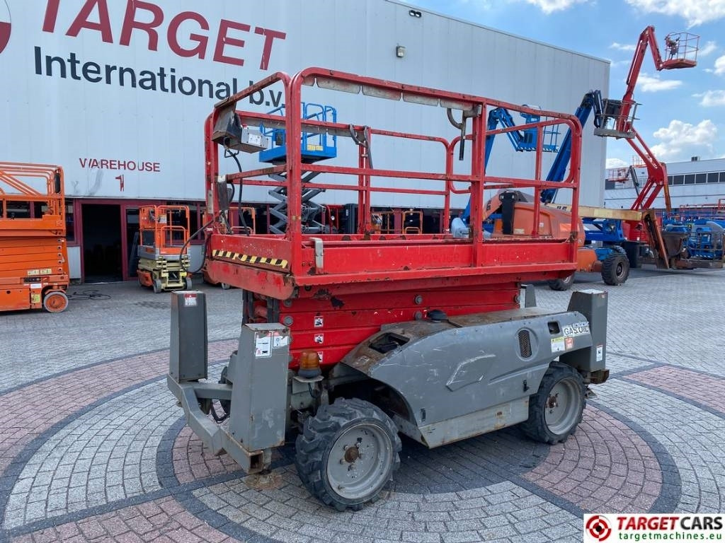 Haulotte Compact 12DX Diesel 4x4 Scissor Work Lift 1206cm - Lift u obliku makaza: slika 1 Haulotte Compact 12DX Diesel 4x4 Scissor Work Lift 1206cm - Lift u obliku makaza: slika 1