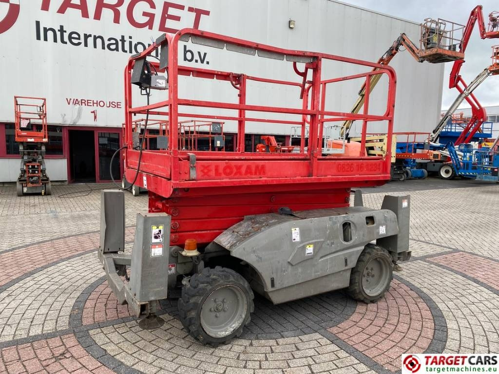 Haulotte Compact 12DX Diesel 4x4 Scissor Work Lift 1206cm  - Lift u obliku makaza: slika 1 Haulotte Compact 12DX Diesel 4x4 Scissor Work Lift 1206cm  - Lift u obliku makaza: slika 1