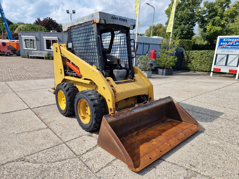 Caterpillar 216B3 schranklader met 1191 uur - Mini utovarivač: slika 2 Caterpillar 216B3 schranklader met 1191 uur - Mini utovarivač: slika 2
