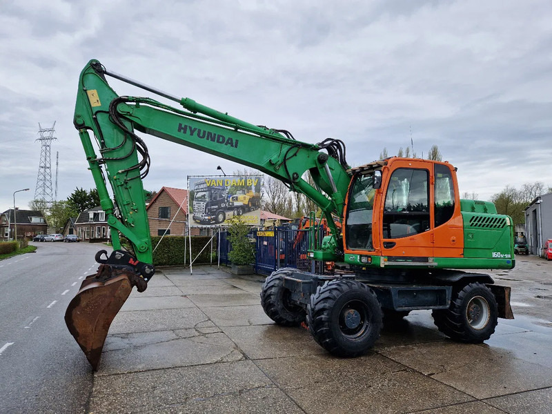 Hyundai Robex 160W-9A met 6-cilinder Cummins motor - Bager točkaš: slika 2 Hyundai Robex 160W-9A met 6-cilinder Cummins motor - Bager točkaš: slika 2