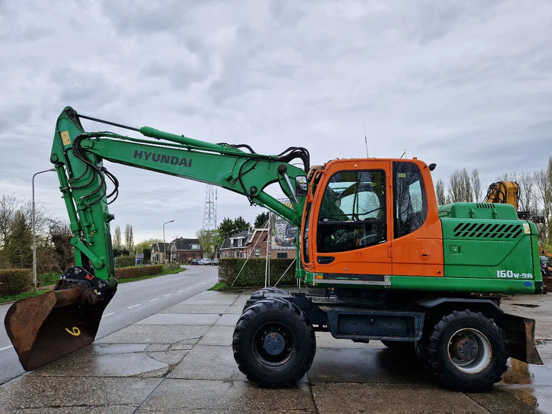 Hyundai Robex 160W-9A met 6-cilinder Cummins motor - Bager točkaš: slika 1 Hyundai Robex 160W-9A met 6-cilinder Cummins motor - Bager točkaš: slika 1