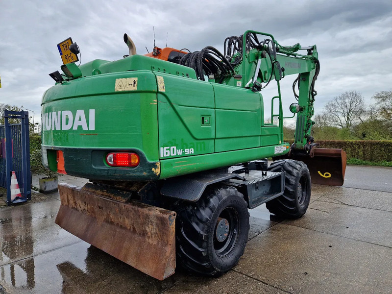 Hyundai Robex 160W-9A met 6-cilinder Cummins motor - Bager točkaš: slika 4 Hyundai Robex 160W-9A met 6-cilinder Cummins motor - Bager točkaš: slika 4