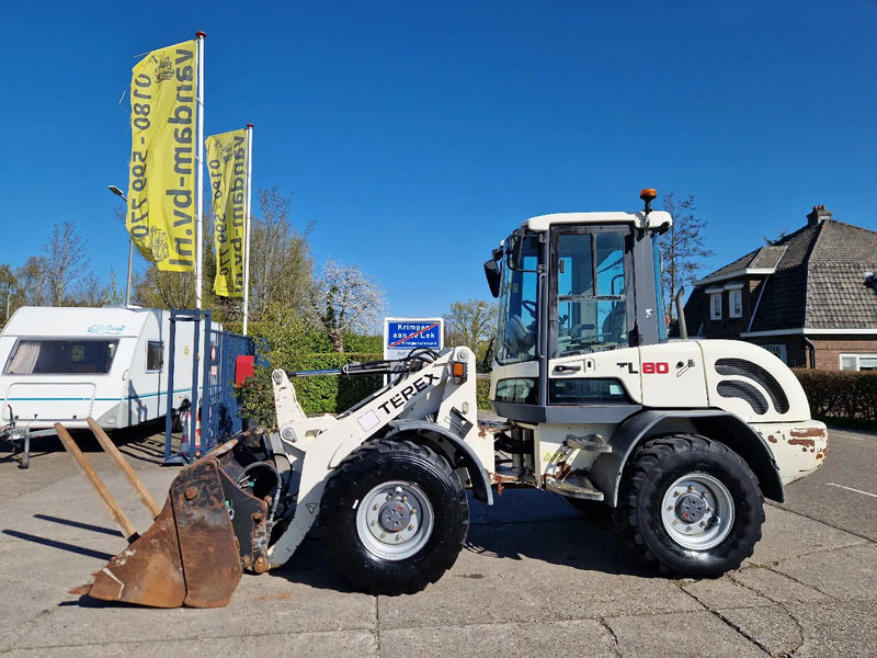 Terex TL80 palletvorken en 4in1-bak - Utovarivač točkaš: slika 1 Terex TL80 palletvorken en 4in1-bak - Utovarivač točkaš: slika 1