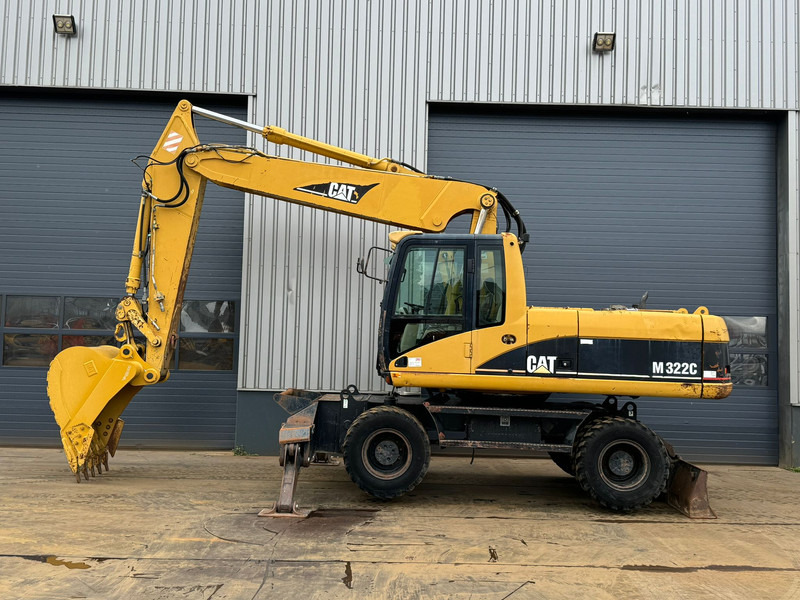 Caterpillar M322C - Hydraulic stabilizers / VA Triple boom / CE-certified, - Bager točkaš: slika 1 Caterpillar M322C - Hydraulic stabilizers / VA Triple boom / CE-certified, - Bager točkaš: slika 1
