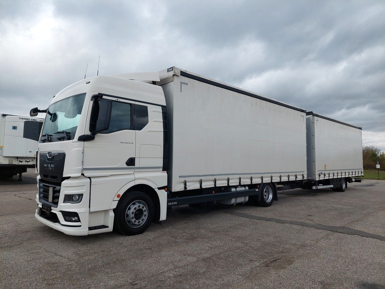 MAN TGX 18.470 LL + Gniotpol G-4080 120 m3 Durchbar - Kamion sa ceradom: slika 1 MAN TGX 18.470 LL + Gniotpol G-4080 120 m3 Durchbar - Kamion sa ceradom: slika 1