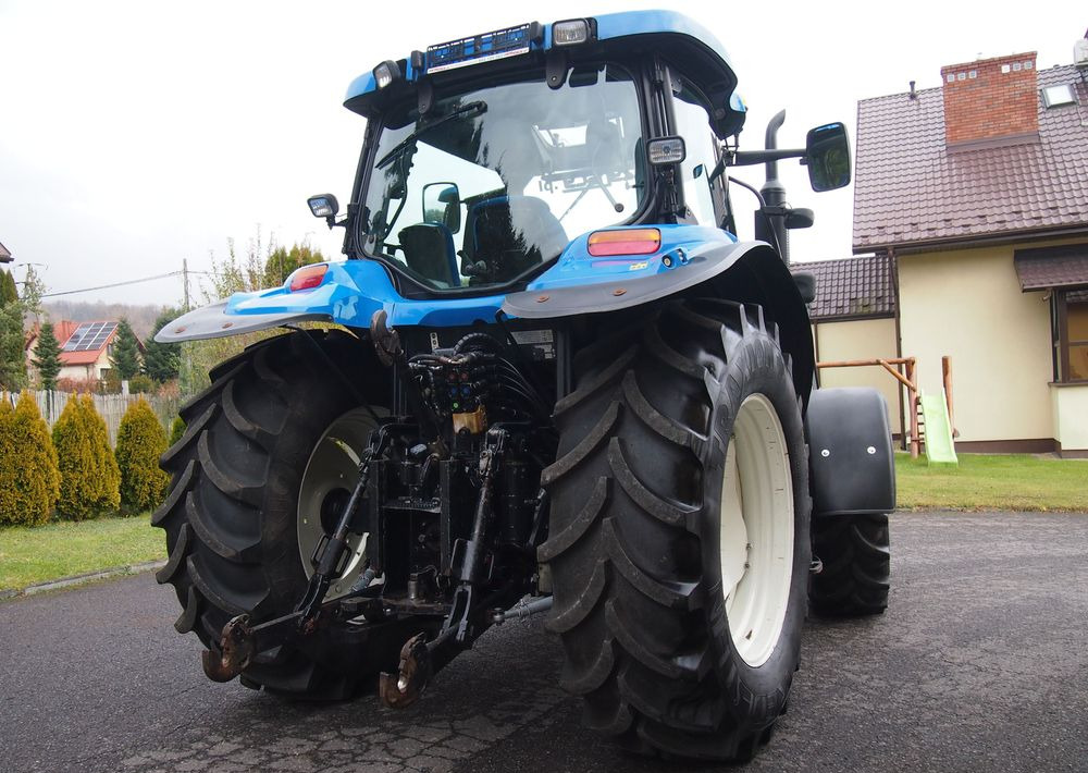 Ciągnik New Holland NH TS125A 6 cylindrów 2004 Ciągnik rolniczy New Holland TS125A - Traktor: slika 5 Ciągnik New Holland NH TS125A 6 cylindrów 2004 Ciągnik rolniczy New Holland TS125A - Traktor: slika 5