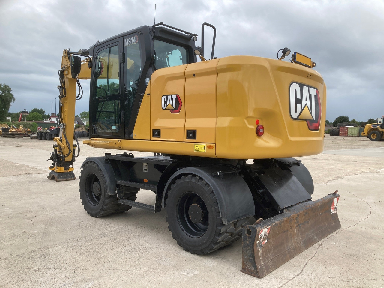 CATERPILLAR M314 - Bager točkaš: slika 1 CATERPILLAR M314 - Bager točkaš: slika 1