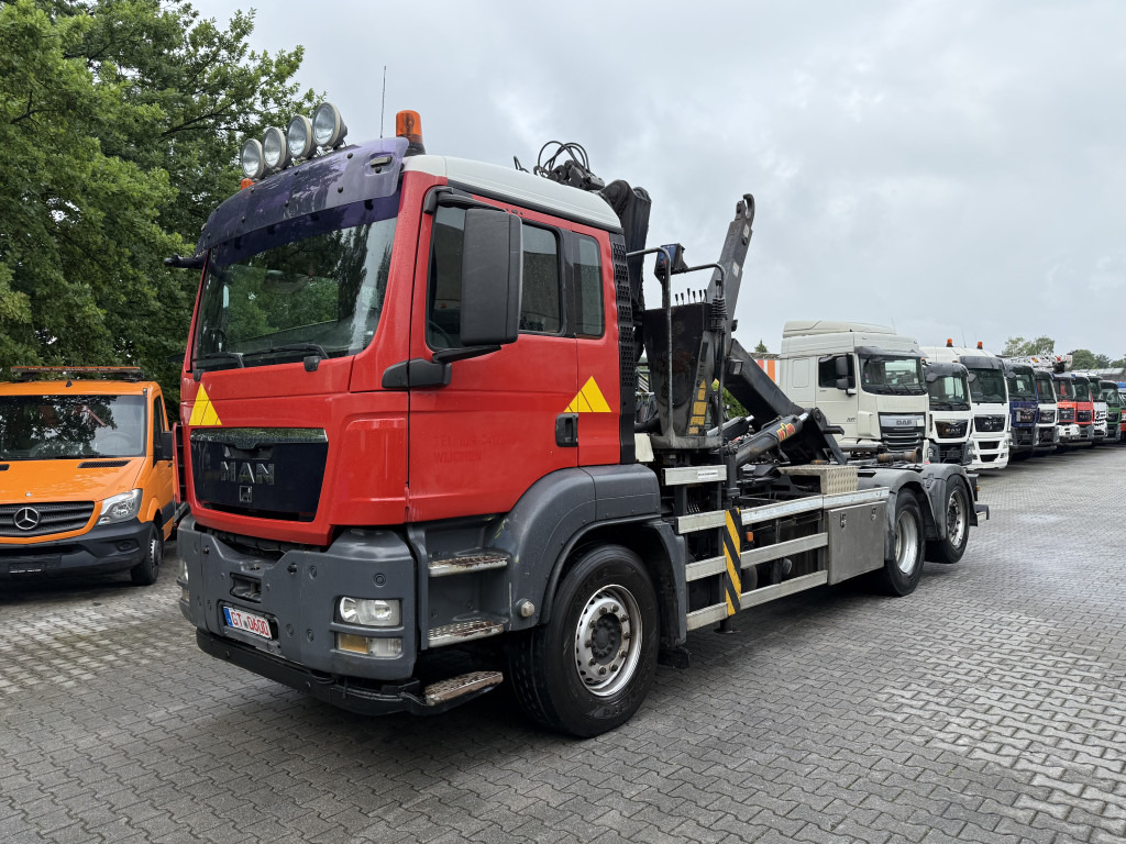 MAN TGS 26.360 6X2 Haken mit Kran HMF 1643Z - Kamion sa hidrauličnom kukom, Kamion sa dizalicom: slika 1 MAN TGS 26.360 6X2 Haken mit Kran HMF 1643Z - Kamion sa hidrauličnom kukom, Kamion sa dizalicom: slika 1