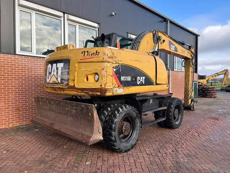 Caterpillar M316D - Bager točkaš: slika 2 Caterpillar M316D - Bager točkaš: slika 2