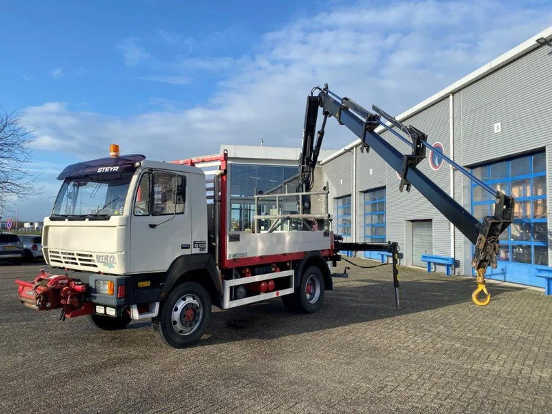 Steyr LÄRMARM 12S23 / 4X4 / CRANE HIAB 092 / WINCH / ONLY: 117406KM / TOP CONDITION / BIG AXLE / FULL STEEL+DRUM BRAKES / MANUAL / EUR - Kamion sa dizalicom: slika 1 Steyr LÄRMARM 12S23 / 4X4 / CRANE HIAB 092 / WINCH / ONLY: 117406KM / TOP CONDITION / BIG AXLE / FULL STEEL+DRUM BRAKES / MANUAL / EUR - Kamion sa dizalicom: slika 1