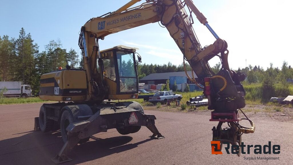 Hjulgrävare Caterpillar M312-4X4 - Bager točkaš: slika 2 Hjulgrävare Caterpillar M312-4X4 - Bager točkaš: slika 2
