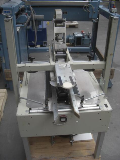 Normpack Tapemat NCG 320 automatic folding carton sealing machine - Mašina za pakovanje: slika 4 Normpack Tapemat NCG 320 automatic folding carton sealing machine - Mašina za pakovanje: slika 4