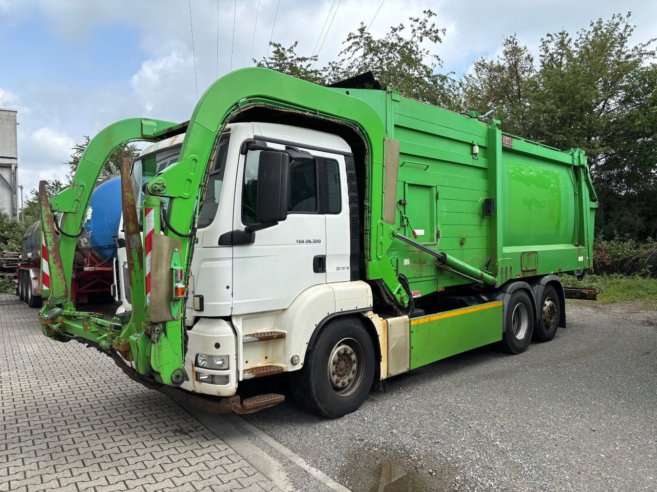 MAN TGS 26.320 EEV Heil Aufbau/Frontlader/Lift - Kamion za smeće: slika 1 MAN TGS 26.320 EEV Heil Aufbau/Frontlader/Lift - Kamion za smeće: slika 1