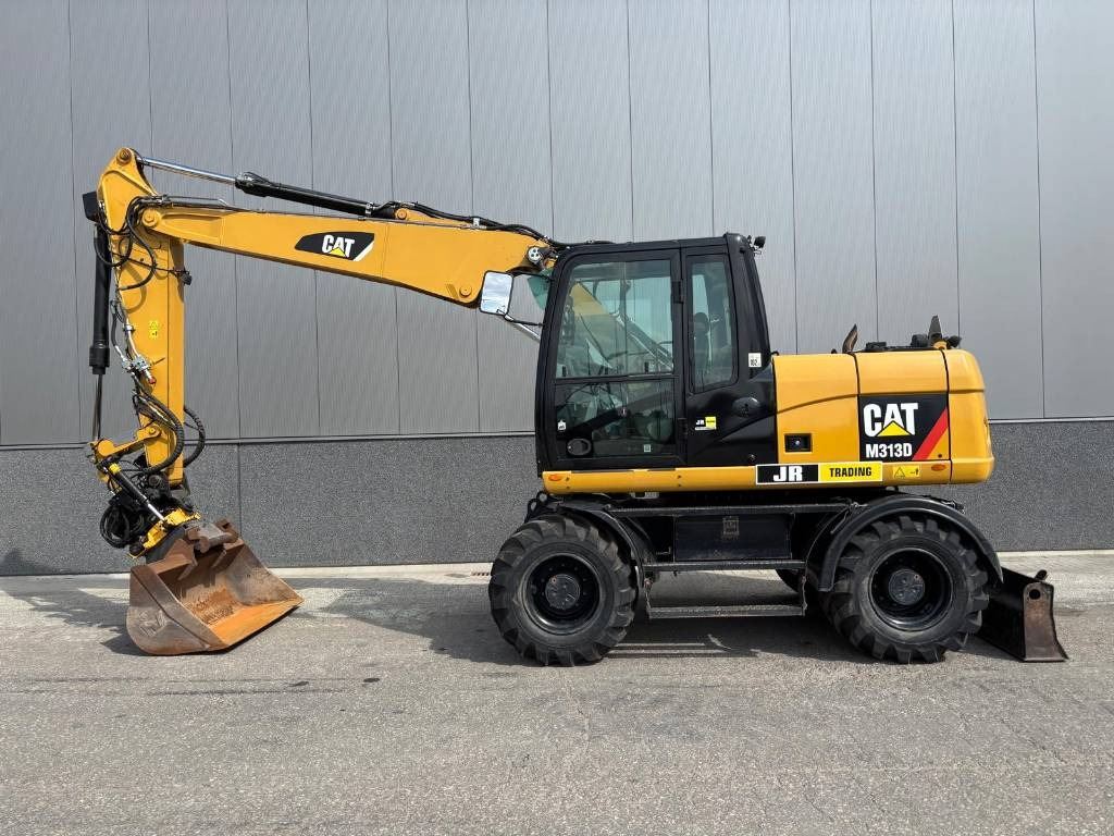 CAT M 313 D - Bager točkaš: slika 1 CAT M 313 D - Bager točkaš: slika 1