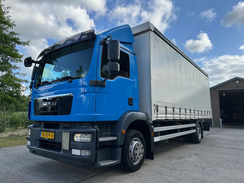 MAN TGM 15.250 / NL TRUCK / EURO 5 / SLIDING ROOF / BOX + TAILLIFT / FULL AIR / NAVI - Kamion sa zatvorenim sandukom: slika 1 MAN TGM 15.250 / NL TRUCK / EURO 5 / SLIDING ROOF / BOX + TAILLIFT / FULL AIR / NAVI - Kamion sa zatvorenim sandukom: slika 1