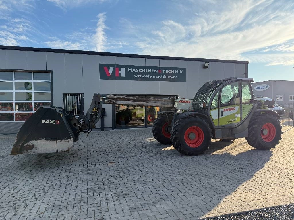 Claas 7040 - Teleskopski upravljač: slika 1 Claas 7040 - Teleskopski upravljač: slika 1