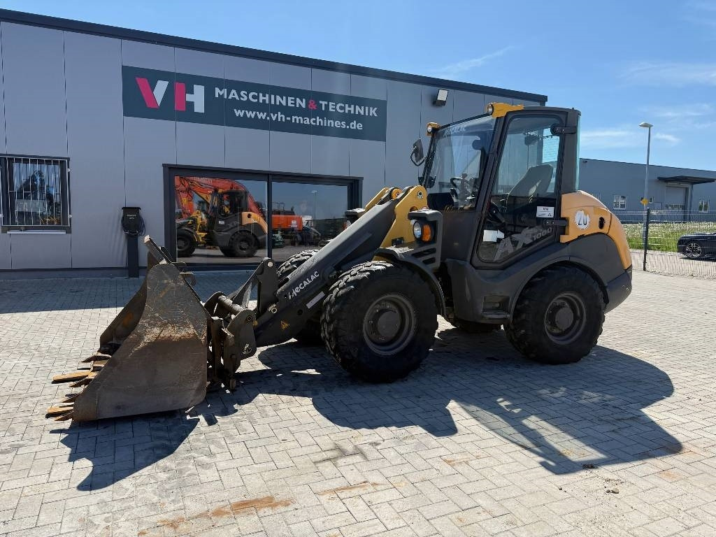 Mecalac AX 1000 - Utovarivač točkaš: slika 1 Mecalac AX 1000 - Utovarivač točkaš: slika 1