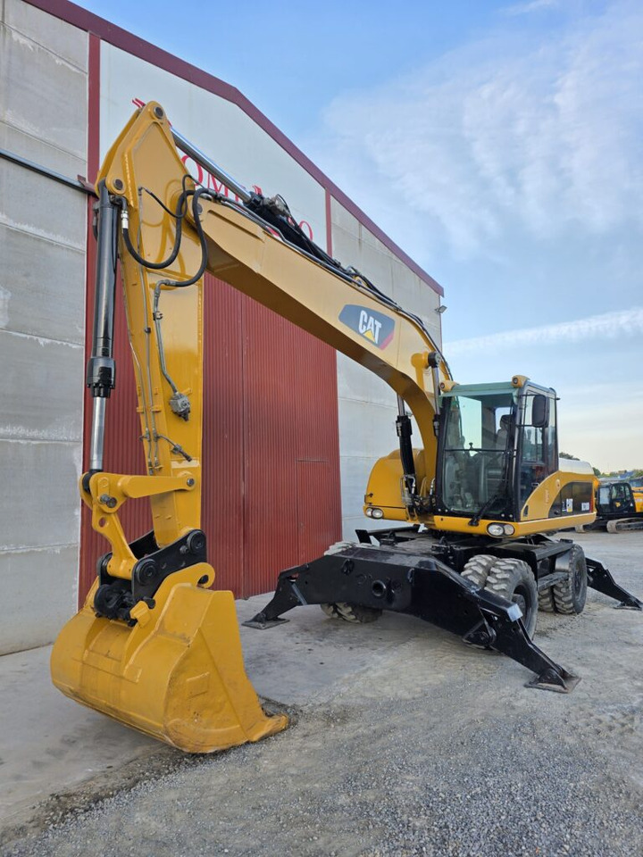 CAT M318D - Bager točkaš: slika 3 CAT M318D - Bager točkaš: slika 3