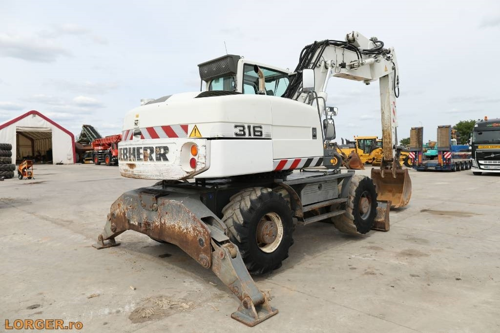 Liebherr A 316 Litronic - Bager točkaš: slika 2 Liebherr A 316 Litronic - Bager točkaš: slika 2