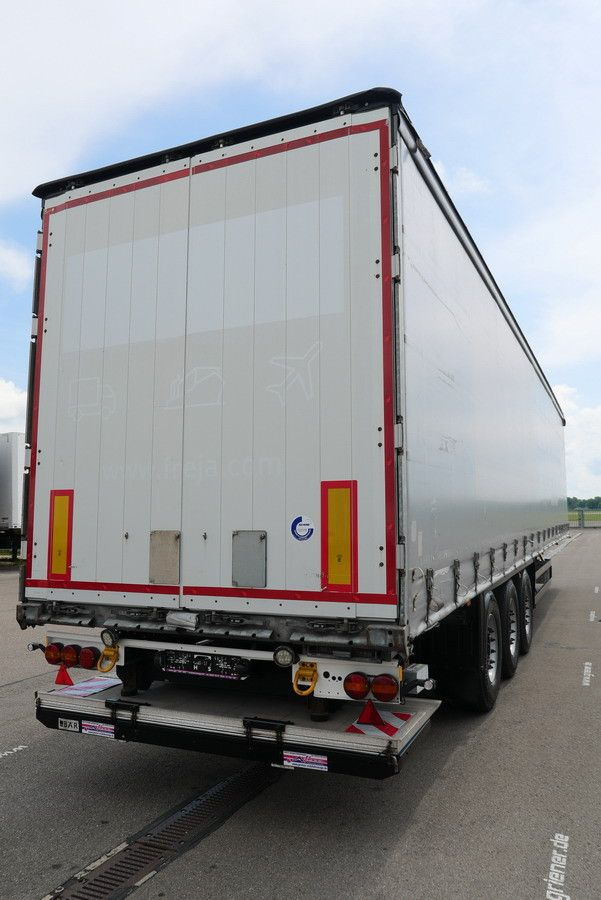 Schmitz Cargobull SCS 24/ LBW 2000 kg / RUNGENTASCHEN / HUBDACH - Poluprikolica sa ceradom: slika 4 Schmitz Cargobull SCS 24/ LBW 2000 kg / RUNGENTASCHEN / HUBDACH - Poluprikolica sa ceradom: slika 4