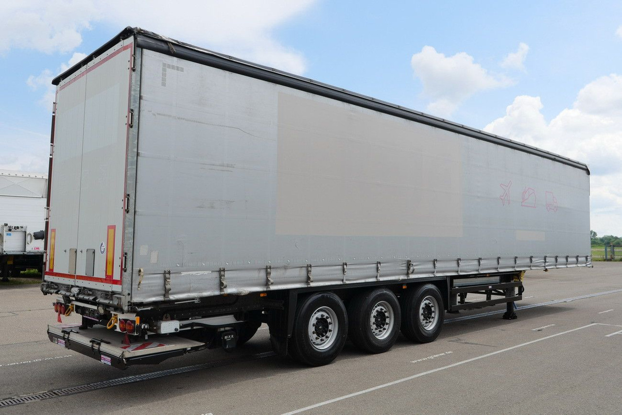Schmitz Cargobull SCS 24/ LBW 2000 kg / RUNGENTASCHEN / HUBDACH - Poluprikolica sa ceradom: slika 5 Schmitz Cargobull SCS 24/ LBW 2000 kg / RUNGENTASCHEN / HUBDACH - Poluprikolica sa ceradom: slika 5