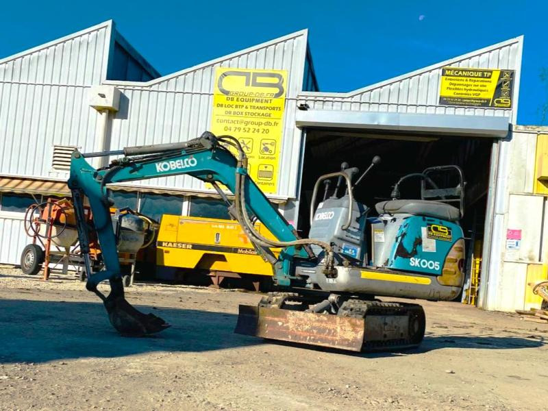 KOBELCO Mini pelle électrique SK007 - Mini bager: slika 1 KOBELCO Mini pelle électrique SK007 - Mini bager: slika 1