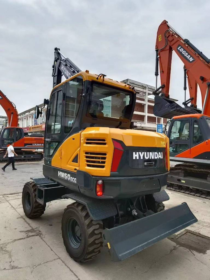 Hyundai 100% new Hyundai HW60ECO - Bager točkaš: slika 1 Hyundai 100% new Hyundai HW60ECO - Bager točkaš: slika 1