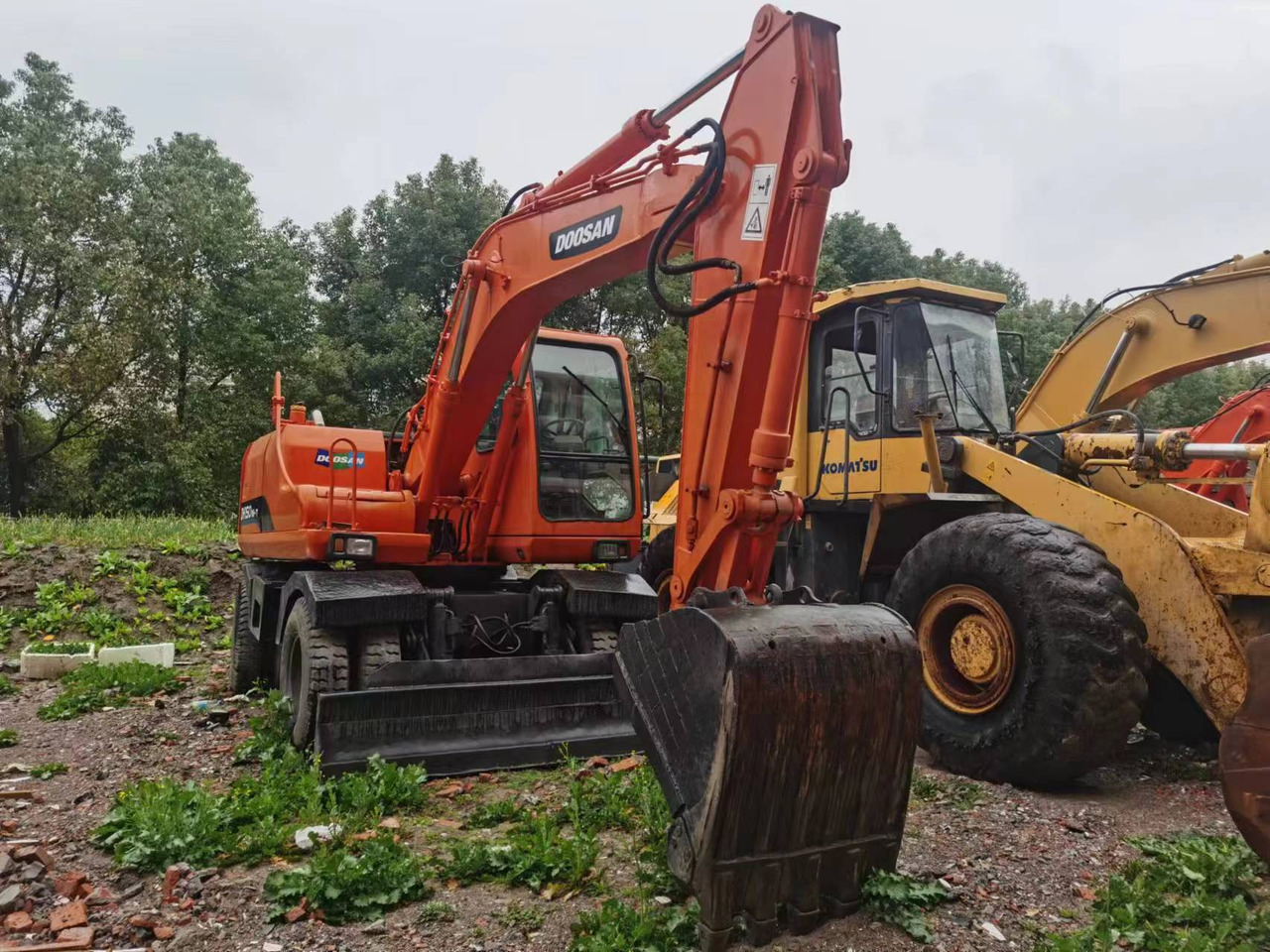 DOOSAN DH150W-7 - Bager točkaš: slika 1 DOOSAN DH150W-7 - Bager točkaš: slika 1