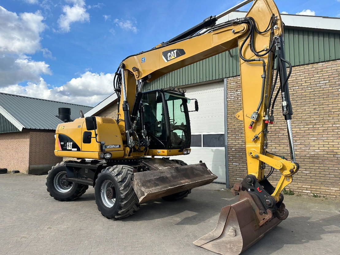 Bager točkaš Caterpillar M313D: slika 7