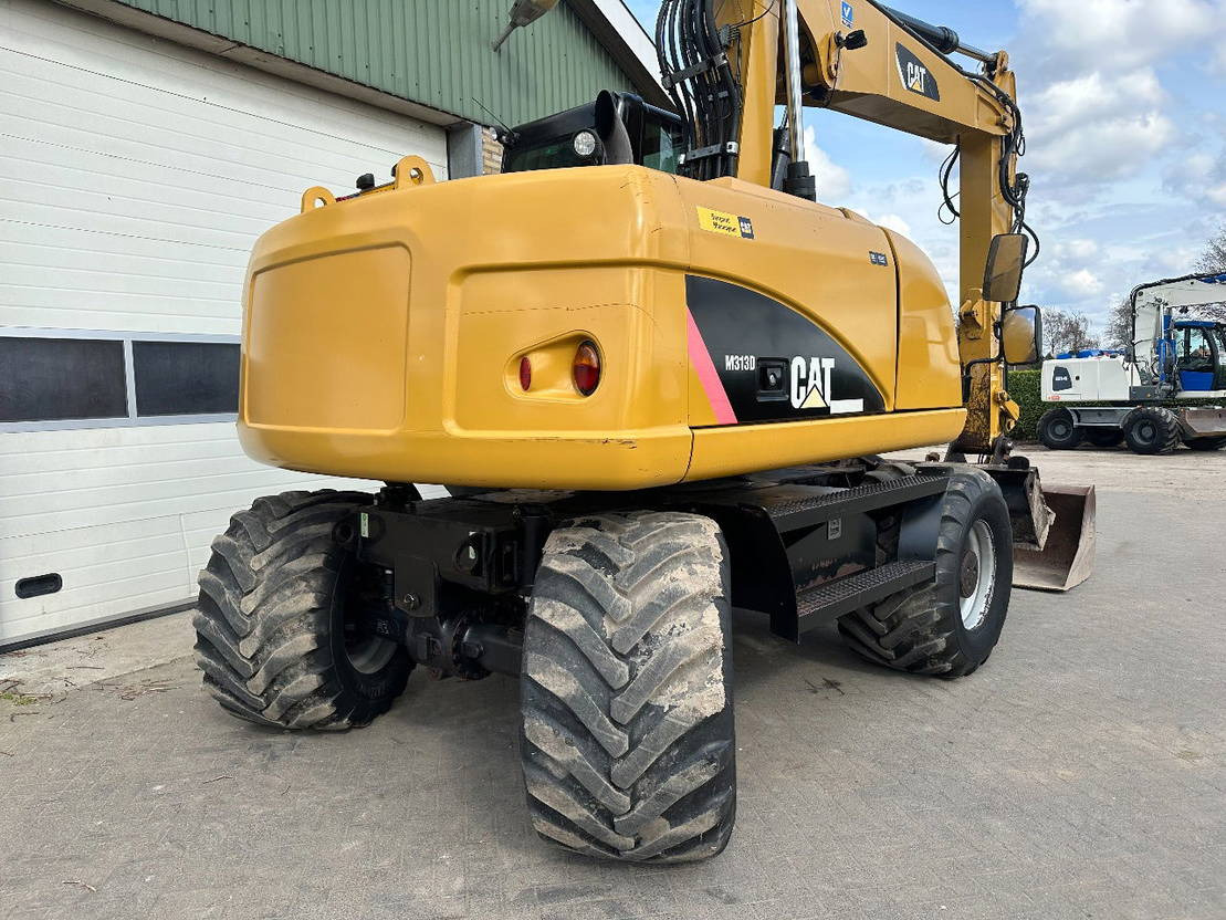Bager točkaš Caterpillar M313D: slika 9
