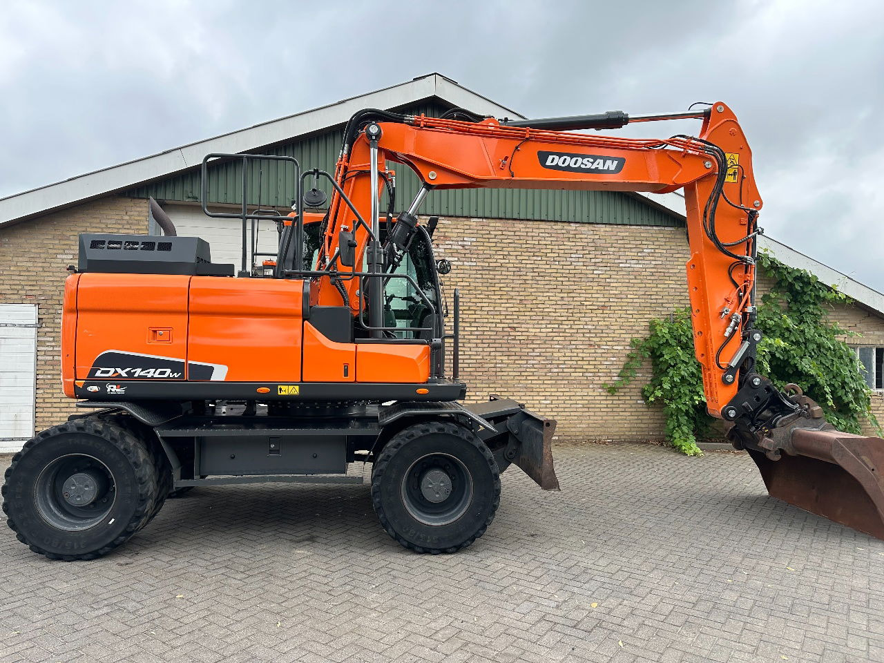 Doosan DX140W-5 - Bager točkaš: slika 5 Doosan DX140W-5 - Bager točkaš: slika 5