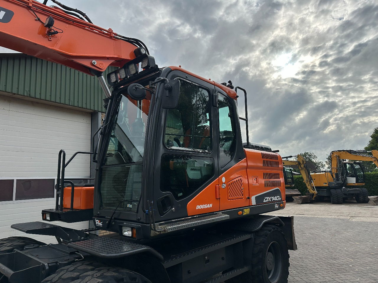 Doosan DX140W-5 - Bager točkaš: slika 3 Doosan DX140W-5 - Bager točkaš: slika 3