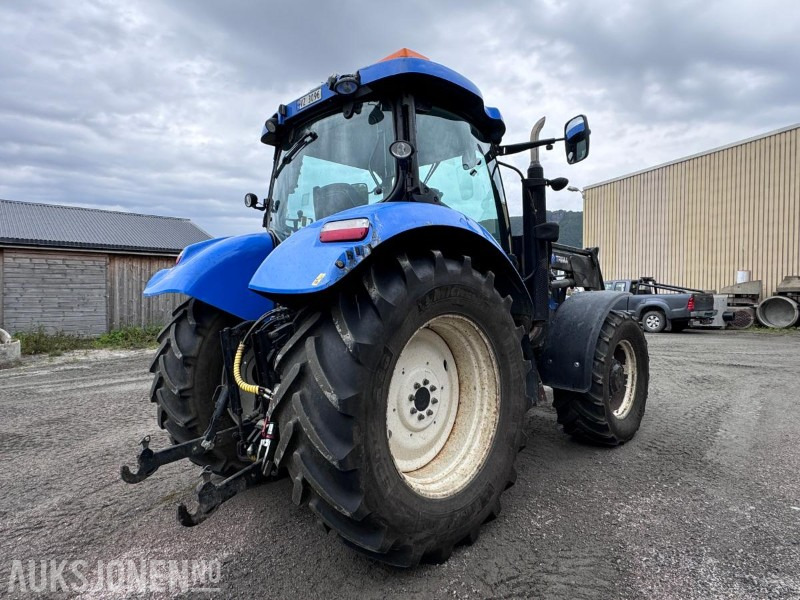 2012 New Holland T6050 med Trima +4.1P frontlaster og panser beskytter - 40 km/t - Traktor: slika 4 2012 New Holland T6050 med Trima +4.1P frontlaster og panser beskytter - 40 km/t - Traktor: slika 4