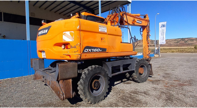Doosan DX140W-3 - Bager točkaš: slika 4 Doosan DX140W-3 - Bager točkaš: slika 4