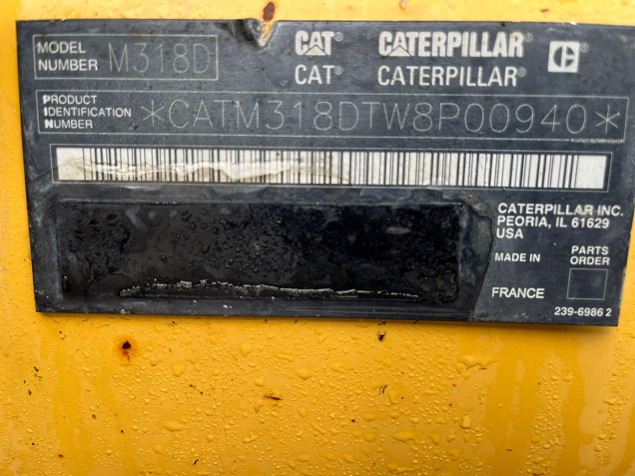 Bager točkaš Caterpillar M318D: slika 24