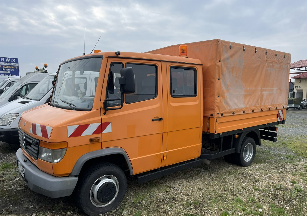 Mercedes-Benz Inny Mercedes-Benz Vario 614 Brygadówka skrzynia plandeka 6-oso doka dokka 2004 - Kamion sa ceradom: slika 4 Mercedes-Benz Inny Mercedes-Benz Vario 614 Brygadówka skrzynia plandeka 6-oso doka dokka 2004 - Kamion sa ceradom: slika 4