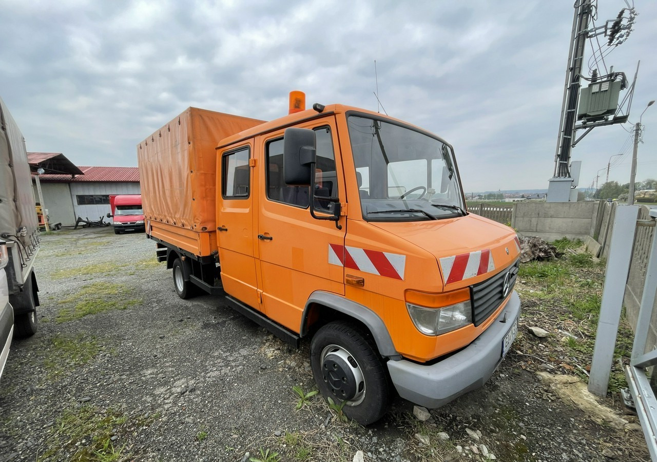 Mercedes-Benz Inny Mercedes-Benz Vario 614 Brygadówka skrzynia plandeka 6-oso doka dokka 2004 - Kamion sa ceradom: slika 1 Mercedes-Benz Inny Mercedes-Benz Vario 614 Brygadówka skrzynia plandeka 6-oso doka dokka 2004 - Kamion sa ceradom: slika 1