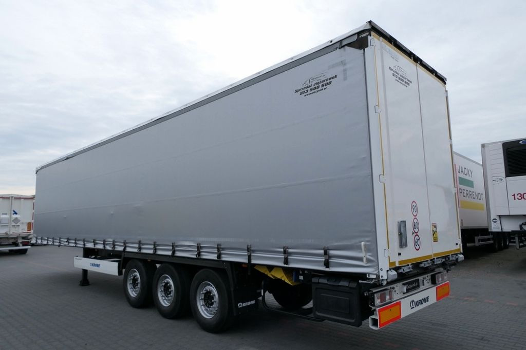 Krone CURTAINSIDER /STANDARD/LIFT ROOF & AXLE Krone CURTAINSIDER /STANDARD/LIFT ROOF & AXLE - Poluprikolica sa ceradom: slika 4 Krone CURTAINSIDER /STANDARD/LIFT ROOF & AXLE Krone CURTAINSIDER /STANDARD/LIFT ROOF & AXLE - Poluprikolica sa ceradom: slika 4
