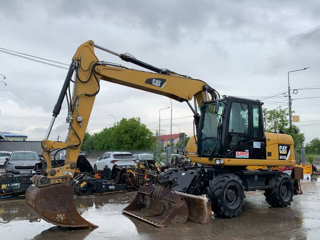 CAT M 313 D - Bager točkaš: slika 1 CAT M 313 D - Bager točkaš: slika 1