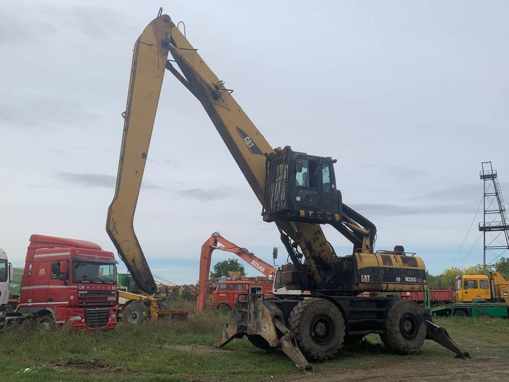 CAT M 325 C L MH - Bager za obradu otpada/ Industrije: slika 1 CAT M 325 C L MH - Bager za obradu otpada/ Industrije: slika 1
