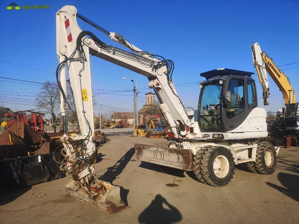 Case WX 125 - Bager točkaš: slika 1 Case WX 125 - Bager točkaš: slika 1