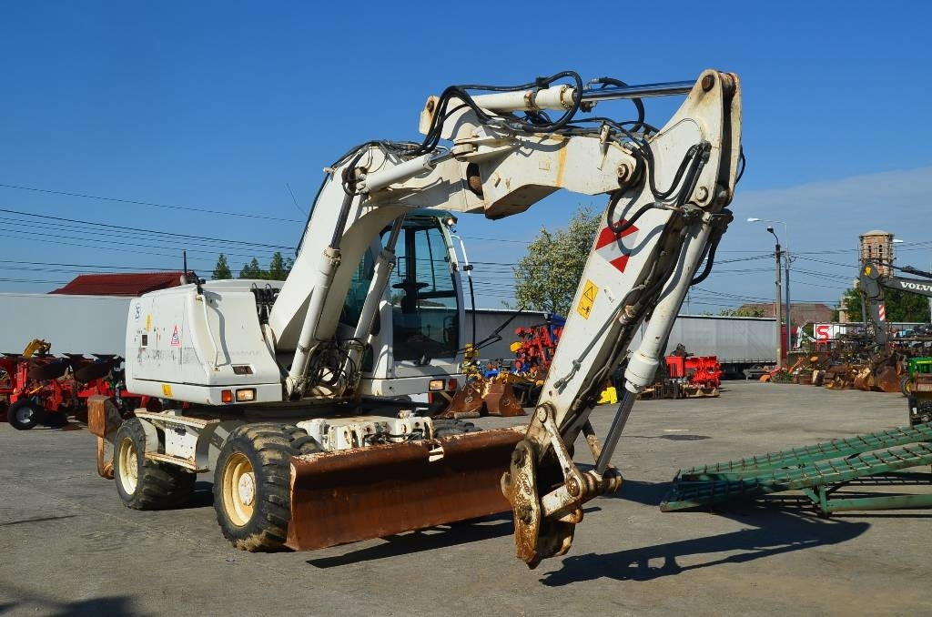 Case WX 145 - Bager točkaš: slika 1 Case WX 145 - Bager točkaš: slika 1