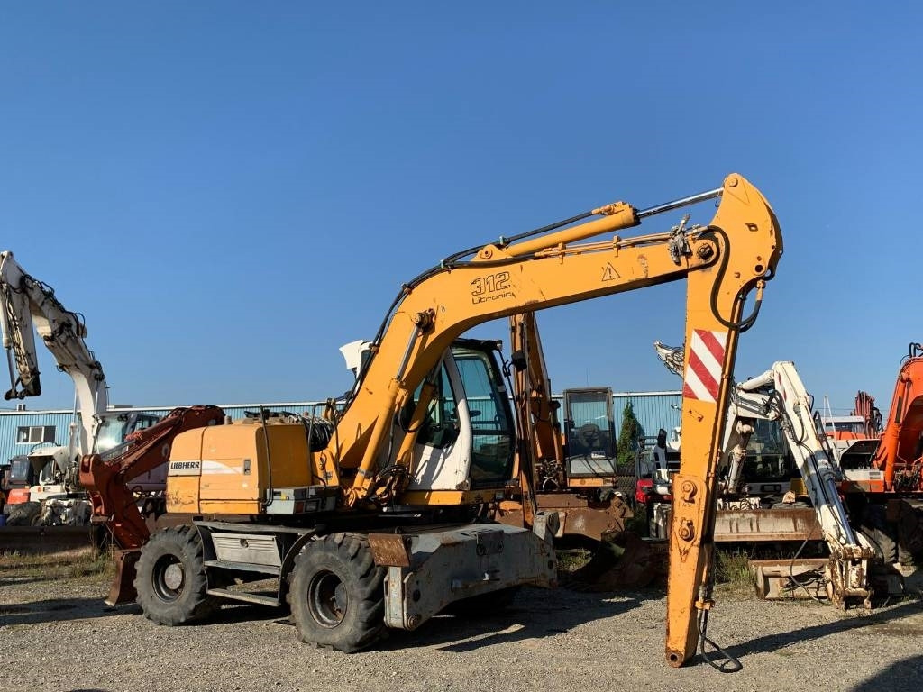 Liebherr A 312 - Bager točkaš: slika 5 Liebherr A 312 - Bager točkaš: slika 5