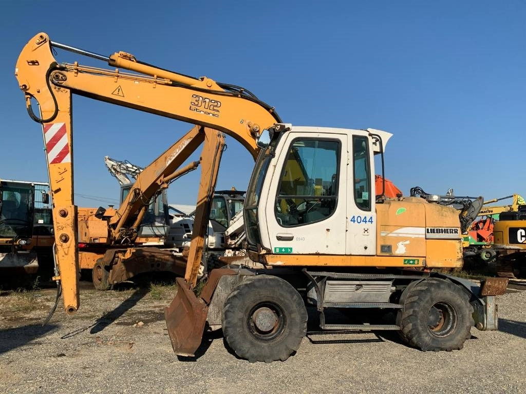 Liebherr A 312 - Bager točkaš: slika 2 Liebherr A 312 - Bager točkaš: slika 2
