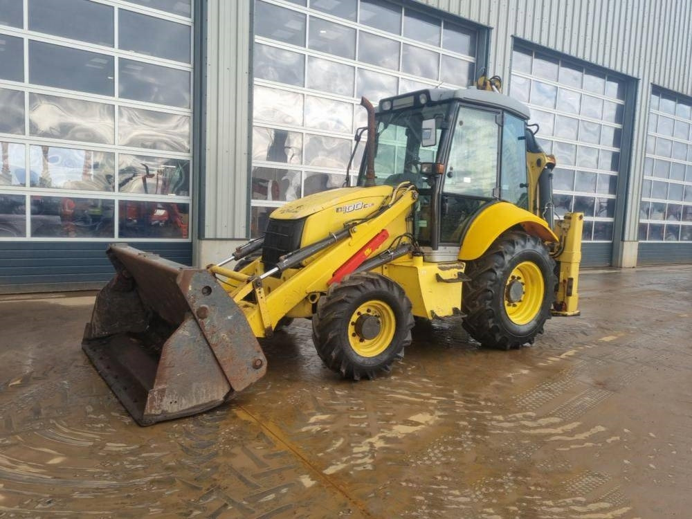 New Holland B 100 C - Bager utovarivač: slika 1 New Holland B 100 C - Bager utovarivač: slika 1