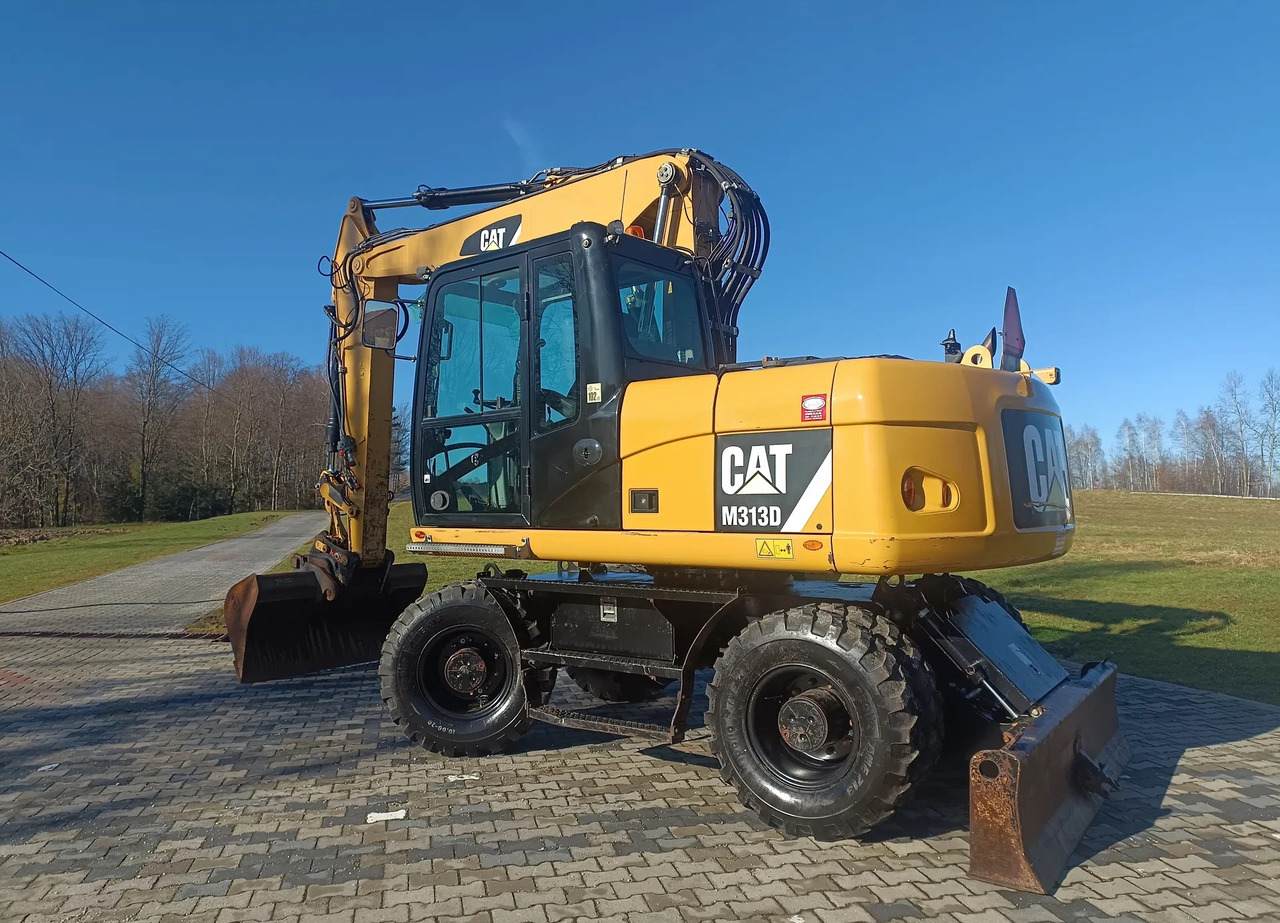 CATERPILLAR M313D - Bager točkaš: slika 1 CATERPILLAR M313D - Bager točkaš: slika 1