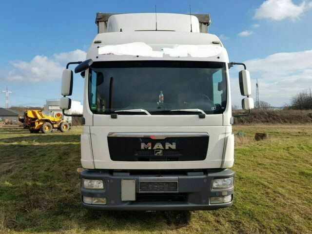 MAN TGL8.240 G.Haus/2xBett Klima AHK - Kamion sa ceradom: slika 1 MAN TGL8.240 G.Haus/2xBett Klima AHK - Kamion sa ceradom: slika 1